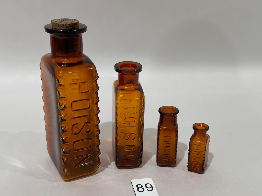 4 Amber Graduated Poison Bottles (1 of 4)