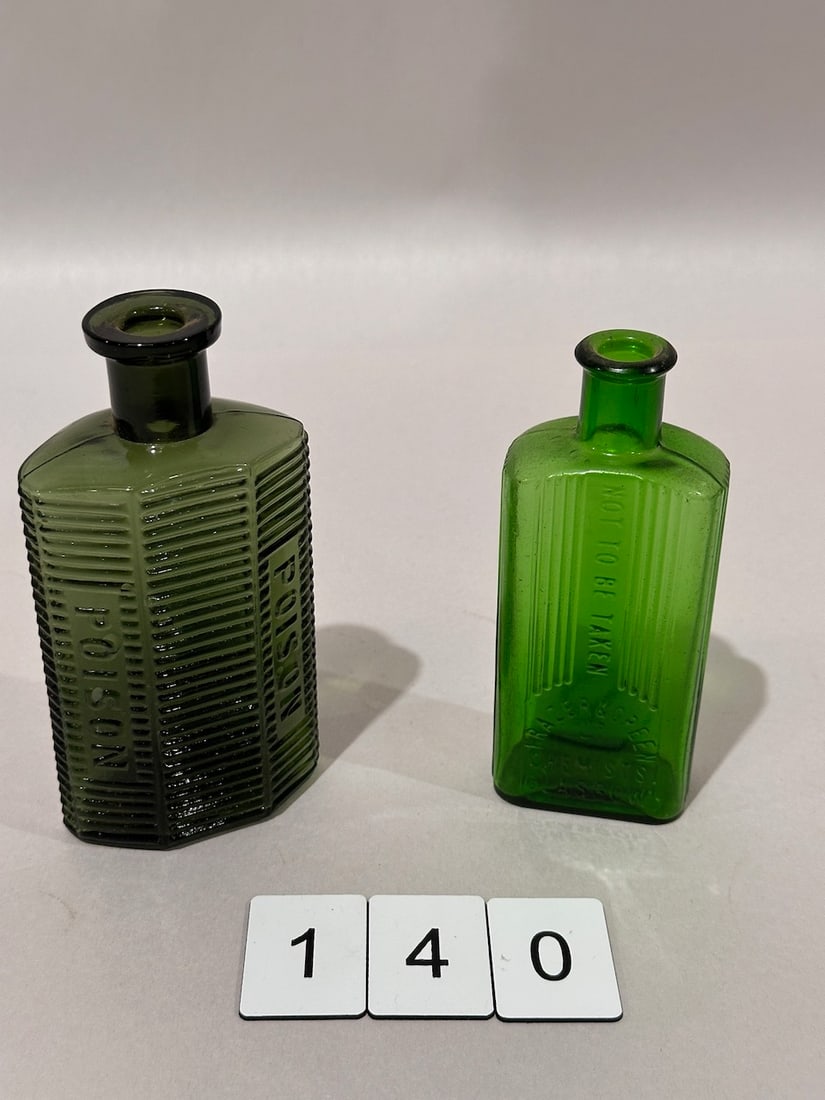 2 Green Embossed Poison Bottles (1 of 2)