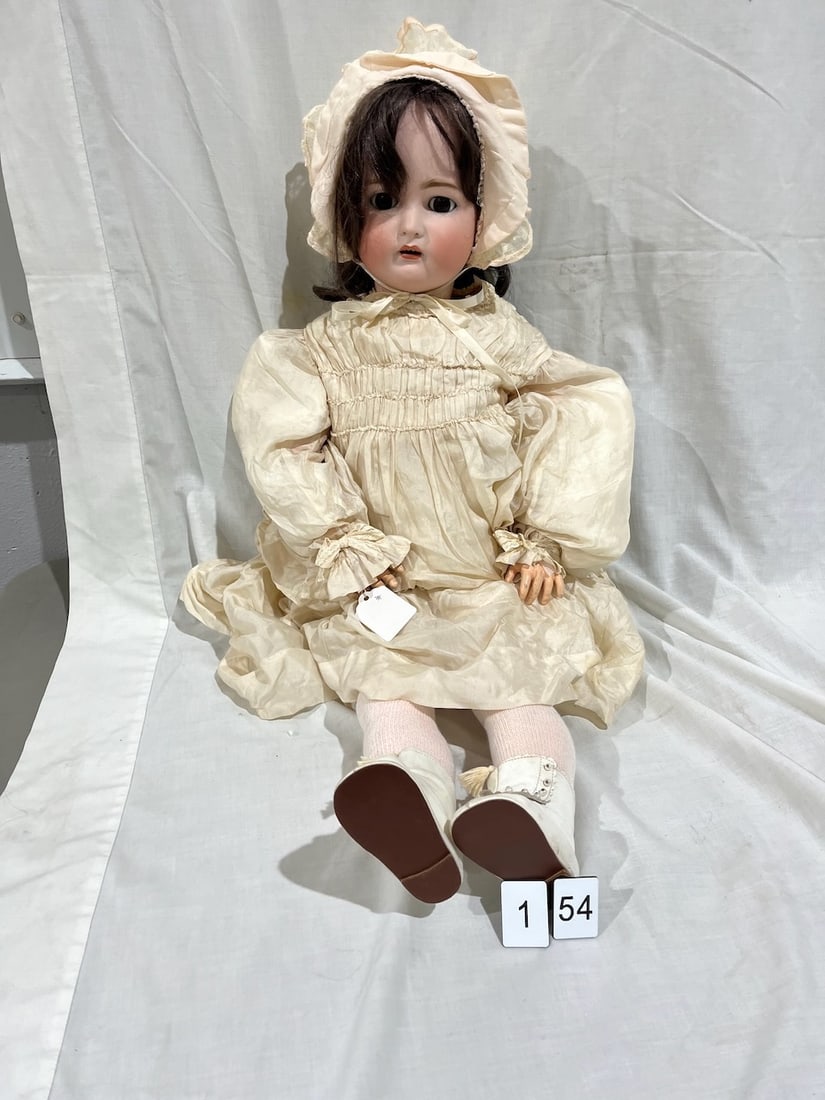 K * R Antique Bisque Doll: Simon & Halbig. OM with teeth, glass eyes, pierced ears, jointed composition body. 32"