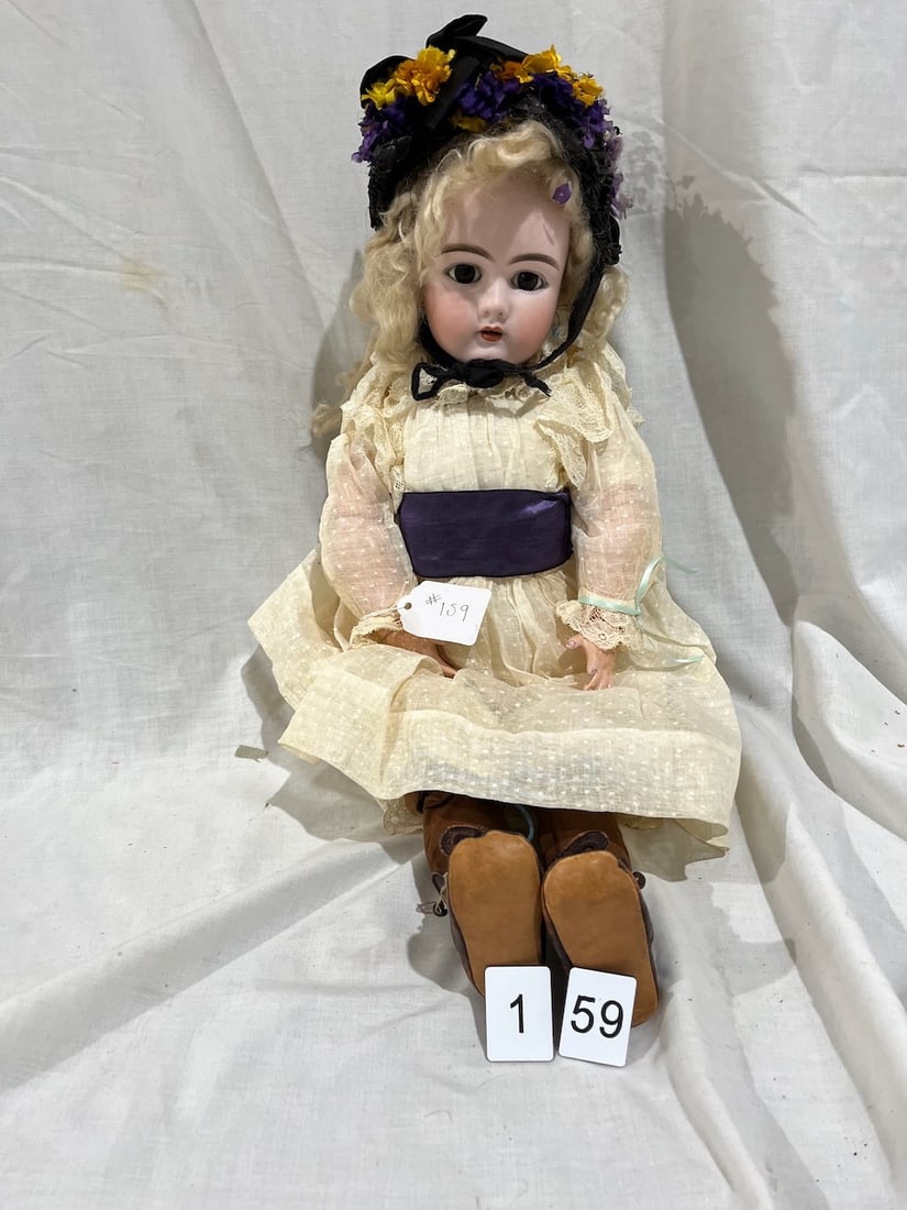 Antique German Bisque Doll: Marked DEP. 109-12 #4. Jointed composition body, sleep eyes, OM with teeth, pierced ears. 21"