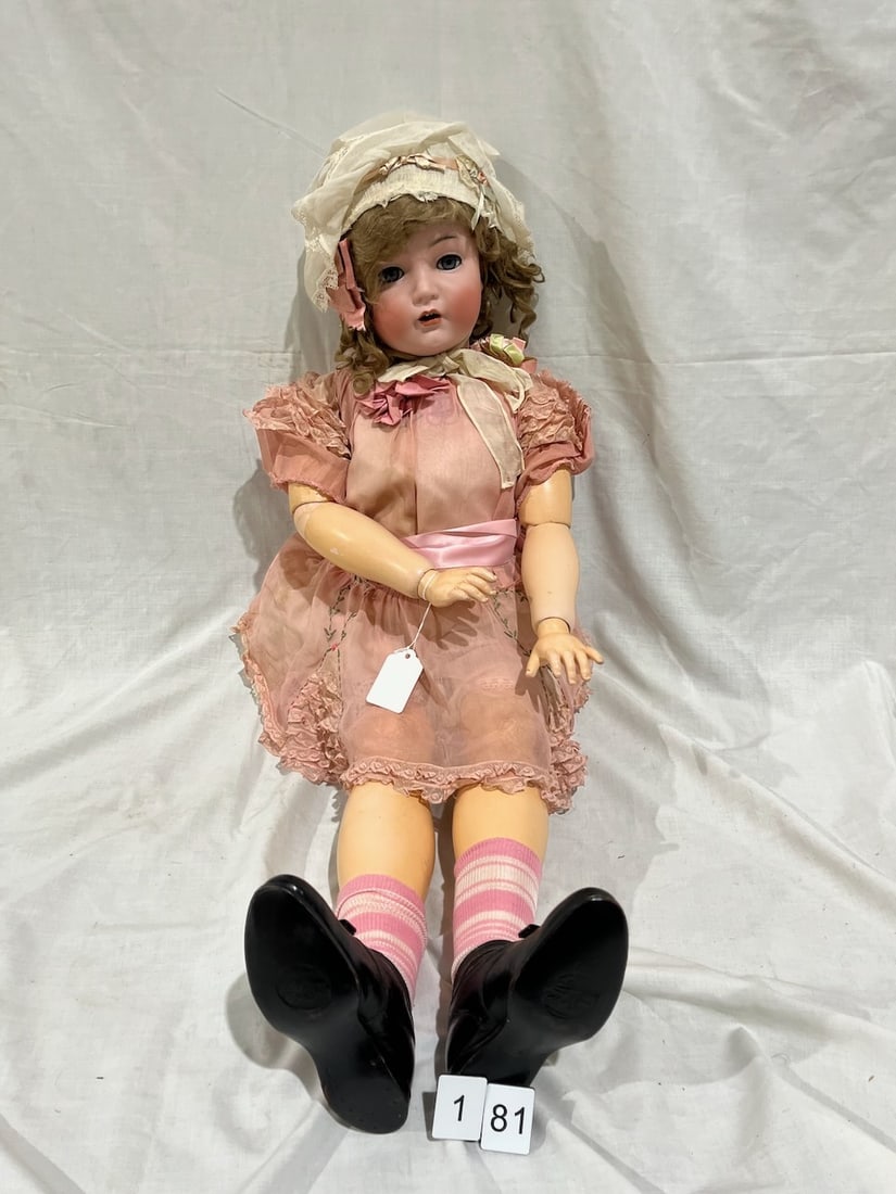 K * R Bisque Doll: Simon & Halbig #117. Germany. Glass eyes, OM with teeth, jointed body. 36"