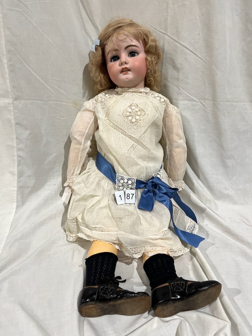 Simon & Halbig Bisque Doll: Marked S & H. 1079.17.DEP. Glass eyes, OM with teeth, pierced ears, 36"