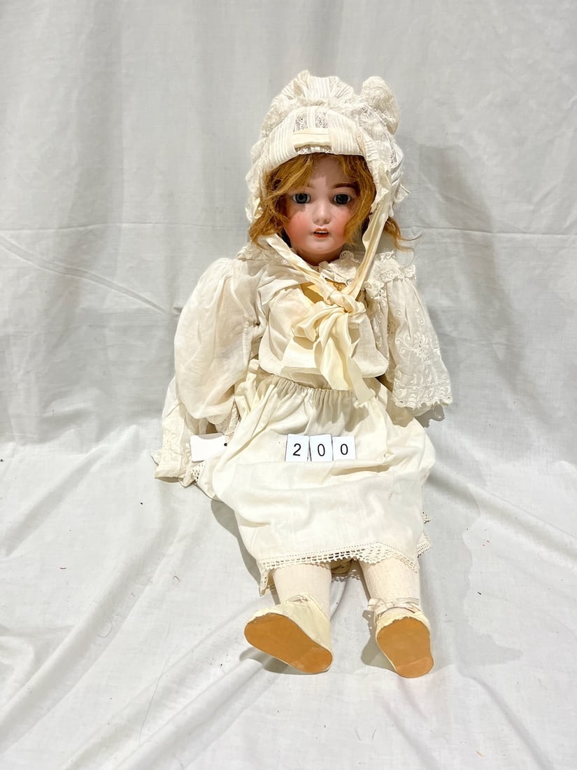 Halbig Bisque Doll: No. 1249 Germany. Halbig S & H. 30". Glass eyes, OM with teeth, pierced ears, jointed composition body