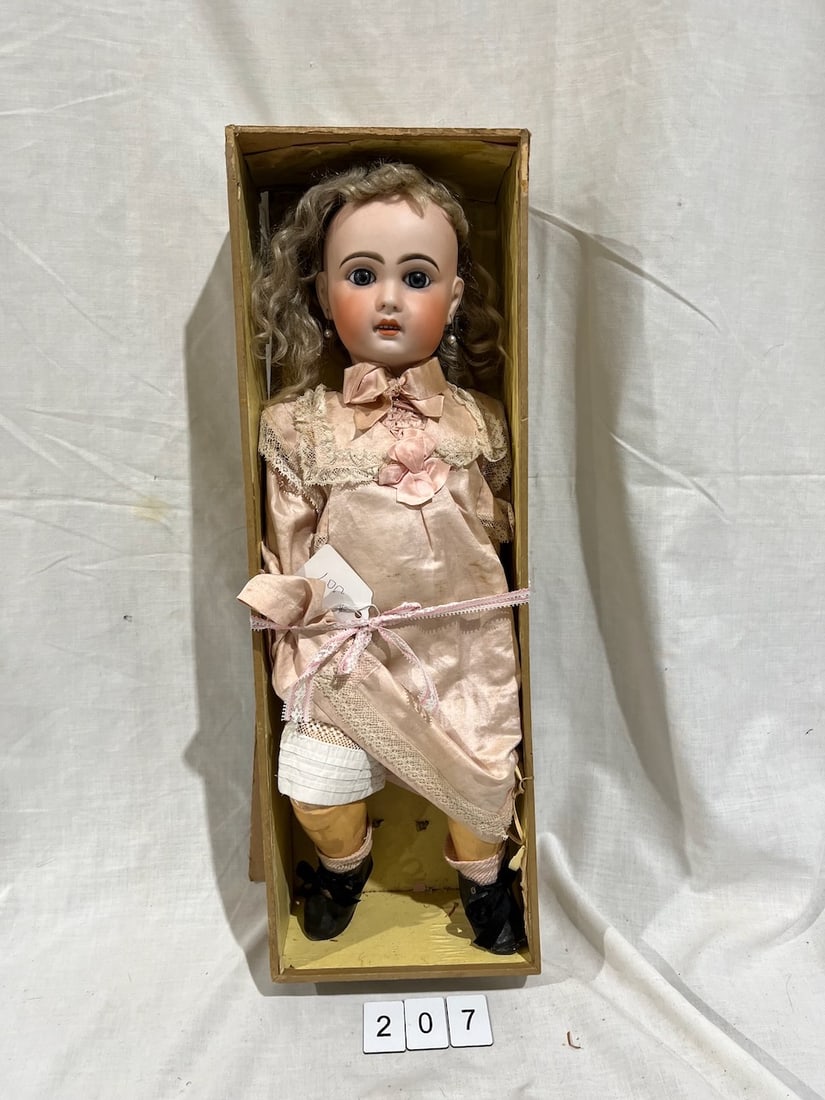 BEBE JUMEAU: No. 9. Cork dome, glass set eyes, OM with teeth, pierced ears, jointed composition body. Partial original box with