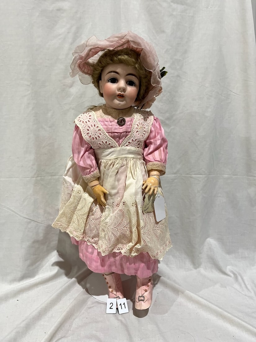 Kestner Antique Bisque Doll: No. 143. 29" A character child. Jointed composition body, glass eyes, OM with teeth. Largest Kestner Doll