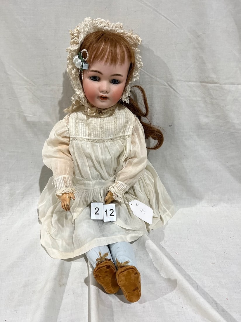 Halbig Bisque Doll: No. 1248 Marked Germany Halbig S&H 13, Glass eyes, OM with teeth, pierced ears, jointed composition body. 25"