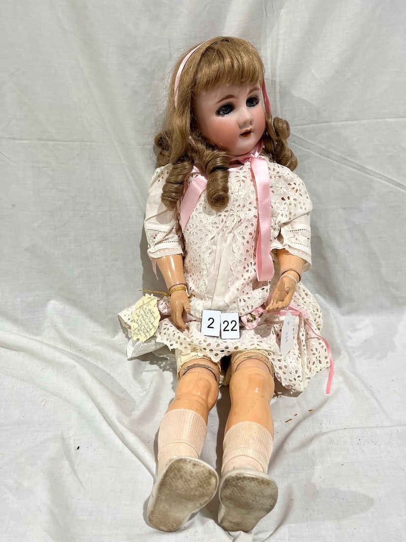 Handwerck Bisque Doll: Heinrich Handwerck. S&H. Germany . 6-1/2. Glass eyes; OM with teeth, pierced ears. 31" Composition jointed body.