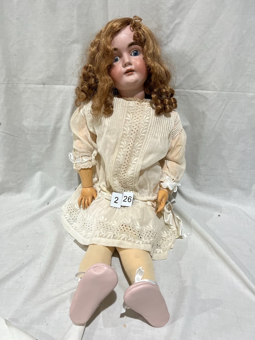Large German Bisque Doll: M 1/2. 16-1/2. 164. Glass eyes; OM with teeth, jointed composition body. 34"