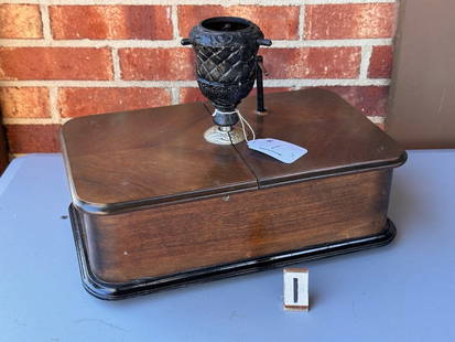 Imperator Disc Music Box Christmas Tree Stand: Plays a 5.5" discs. 19 discs included. Has the key and tree cup. A revolving example. 4 broken teeth