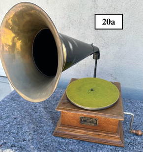 Victor II Disc Phonograph: Brass bell horn. No tonearm or reproducer. Crank