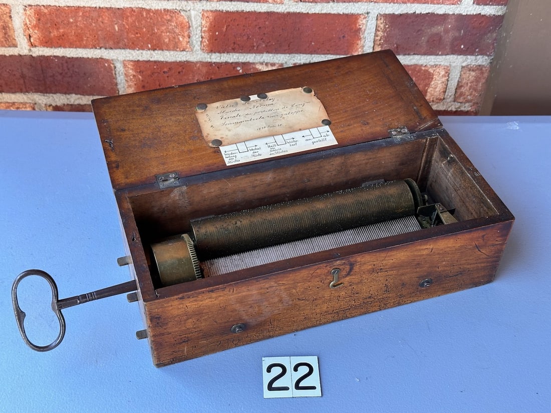Rare and Early Cylinder Music Box: 7.75" cylinder. No broken teeth. Drop-end with key wind. Plays 4 aires