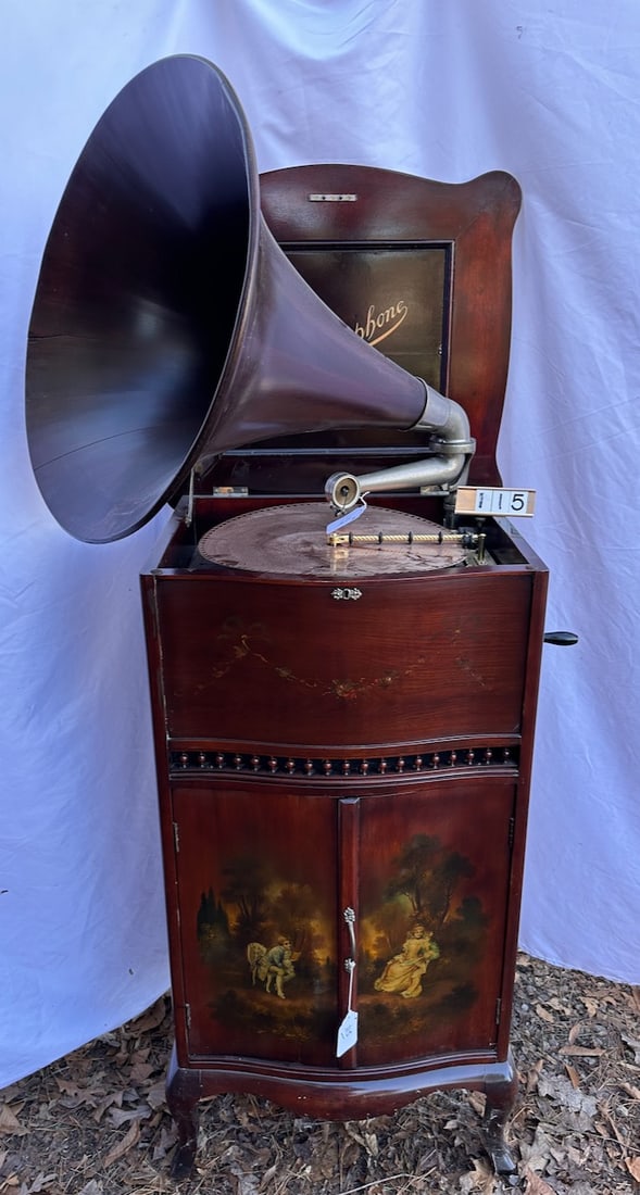 Reginaphone Rookwood Decorated Style 143 (?) Music Box.: Plays 15-1/2" discs. Excellent Rookwood decoration. Style 143 (?). Has a mahogany smooth wooden horn. Pull-out divided disc storage. Include turntable and phonograph parts. A beautiful machine. Double