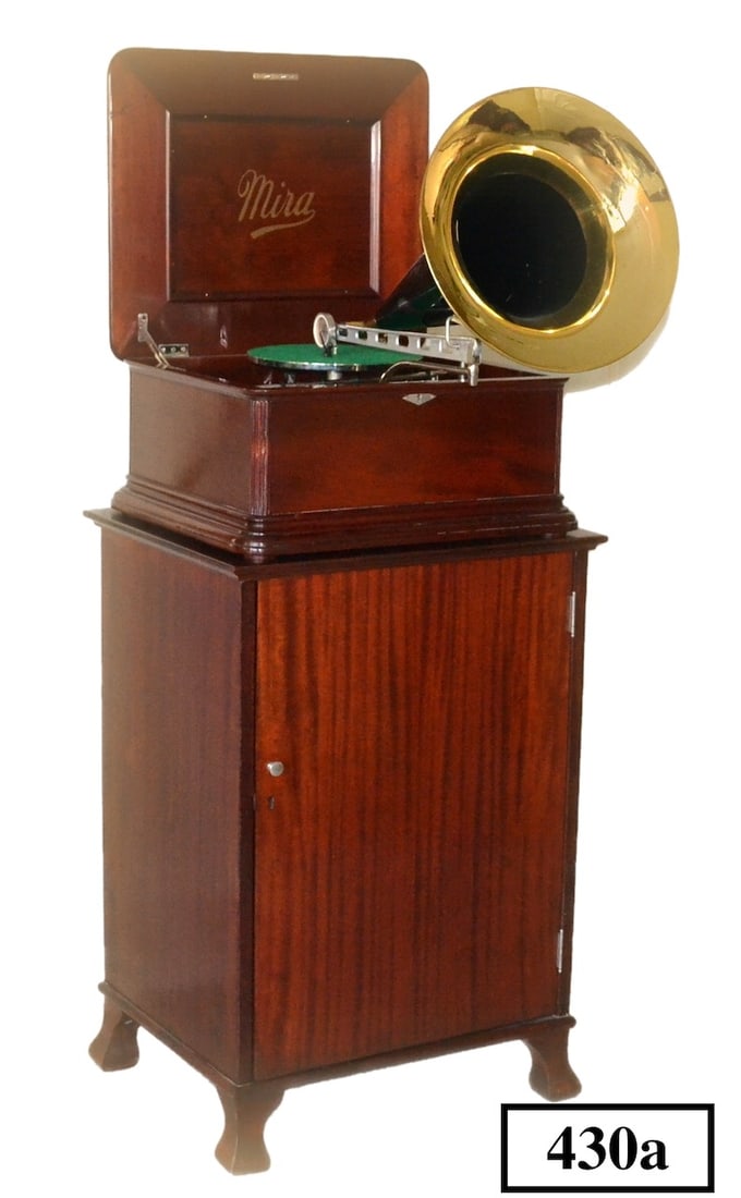 Excellent Miraphone 12" Disc Music Box: Double comb(no broken teeth), Mahogany case, Completely restored with matching cabinet for disc and record storage. 10 music box discs included.