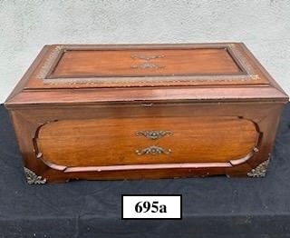 Swiss Orchestral Cylinder Music Box: 10 Tune, 6 saucers bells, one with bee striker, drum, and castanet. Walnut case with brass trim.