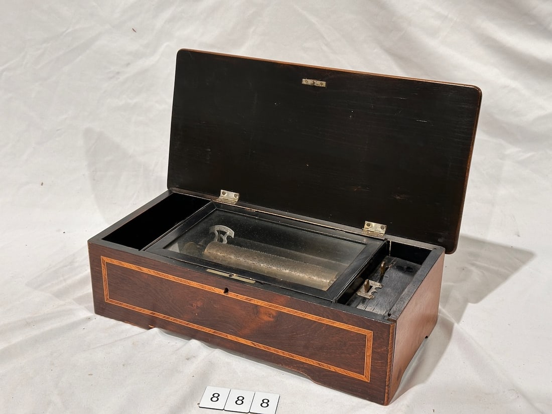 7-1/2" Cylinder Music Box: 8 tune. No broken teeth. Inlaid flowered top.