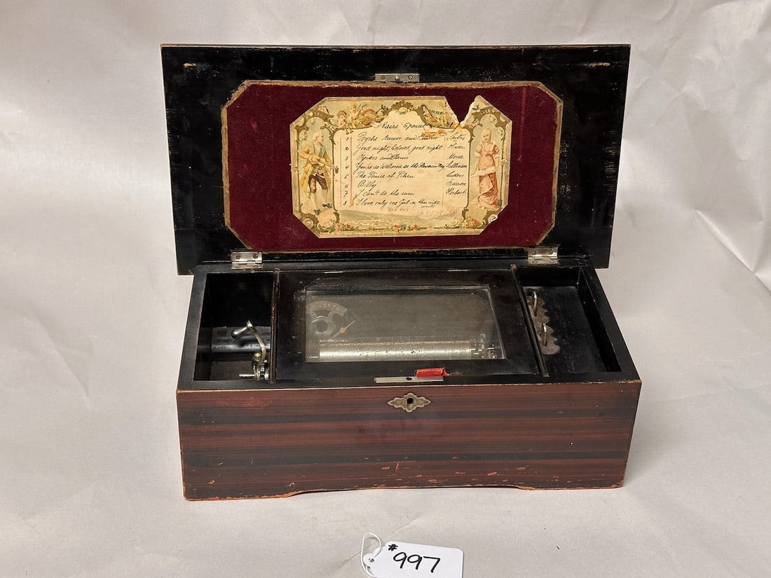 5" Cylinder Music Box: 8 airs, original tune card. Ratchet wind crank is bent. Untested.