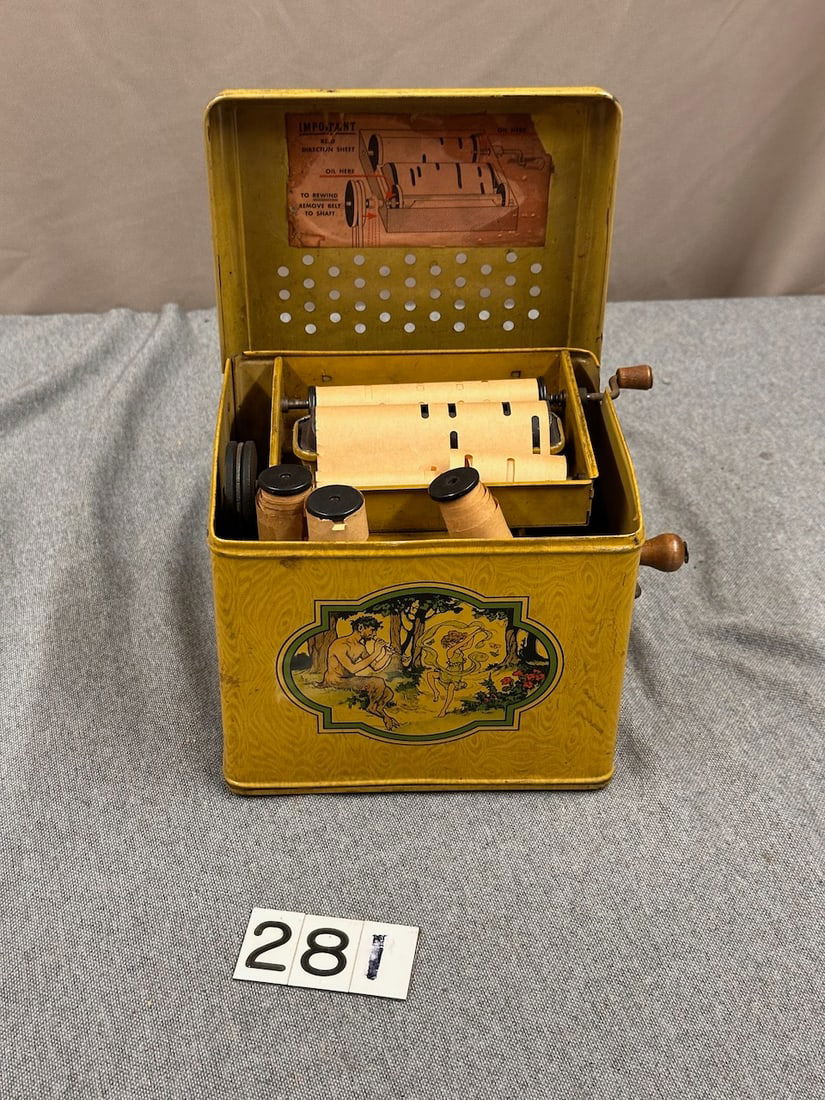 Melody Player: Paper Roll organ. Metal case with graphics. 5 rolls