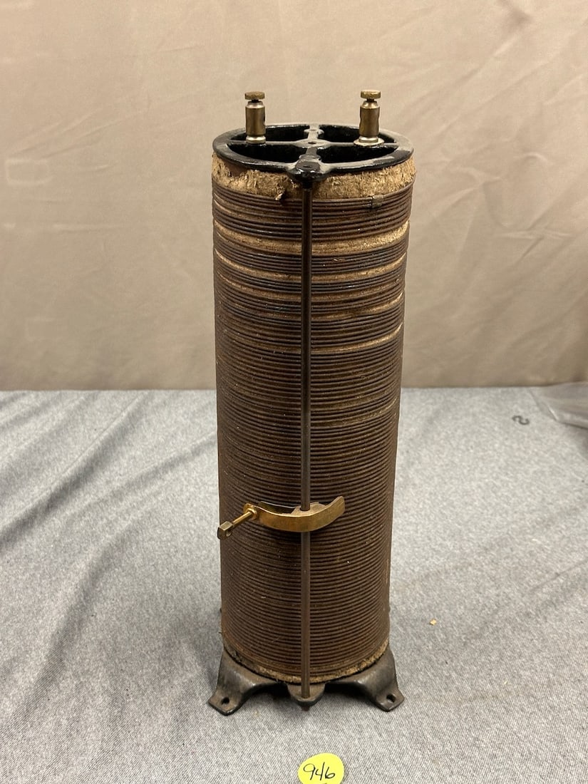 Electric Cylindrical Apparatus: Cast iron base. 18" tall x 5" diameter