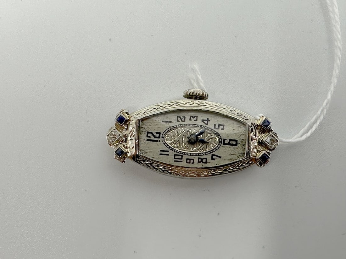 Ladies 18k Wrist Watch: 17j, marked 18k & platinum trim, Diamonds & Sapphires? See pic. No band.