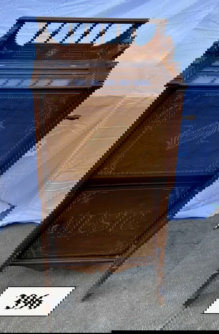 Rare floor model Tournaphone Roller Organ: Extensive decals in excellent condition. Playing excellent; overall condition excellent.3 rolls 13-1/2" rolls included. 43 x 19 x 15 inches.