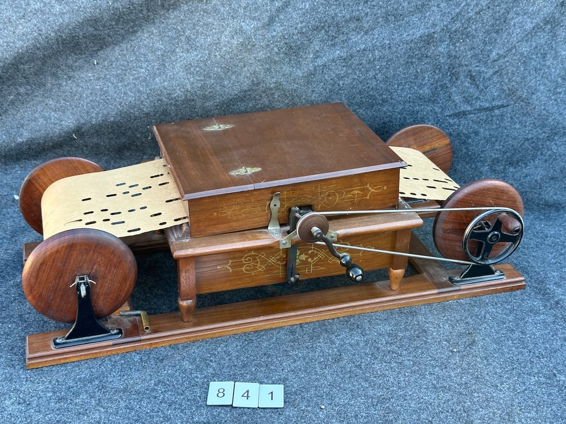 Musical Cabinetto Paper Roll Organ: No. 556, 25 Reeds. One roll included