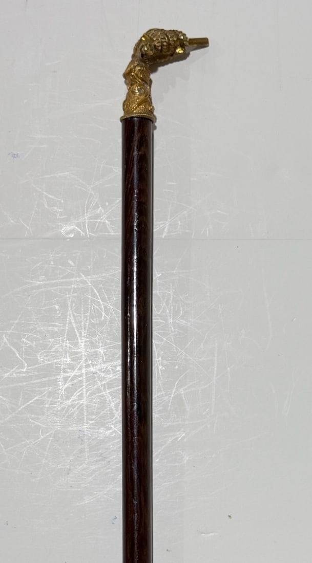 Presentation Cane- Gold Filled Hand Holding A Pistol C1890: 34" Rosewood Shaft, Wood Ferrule.