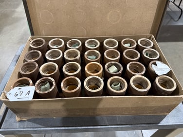 28 Brown Wax Cylinders