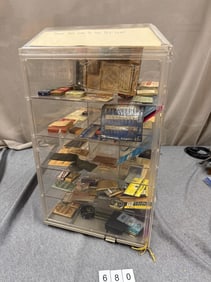 Display Case with needle packets, tins. Etc.