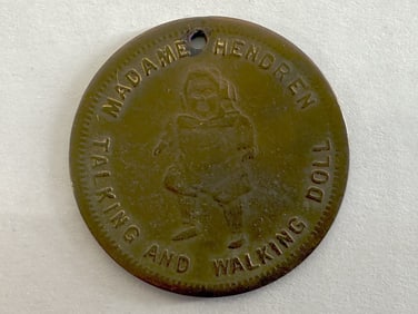 Madam Hendron Brass Good Luck Token