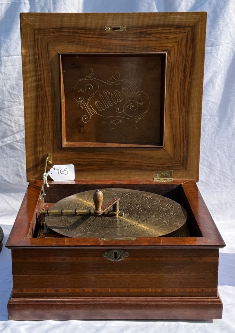Kalliope 13-1/4" 10 Bell Disc Music Box: Walnut, Center crank, single comb no broken teeth, 15-13-1/4" discs included,