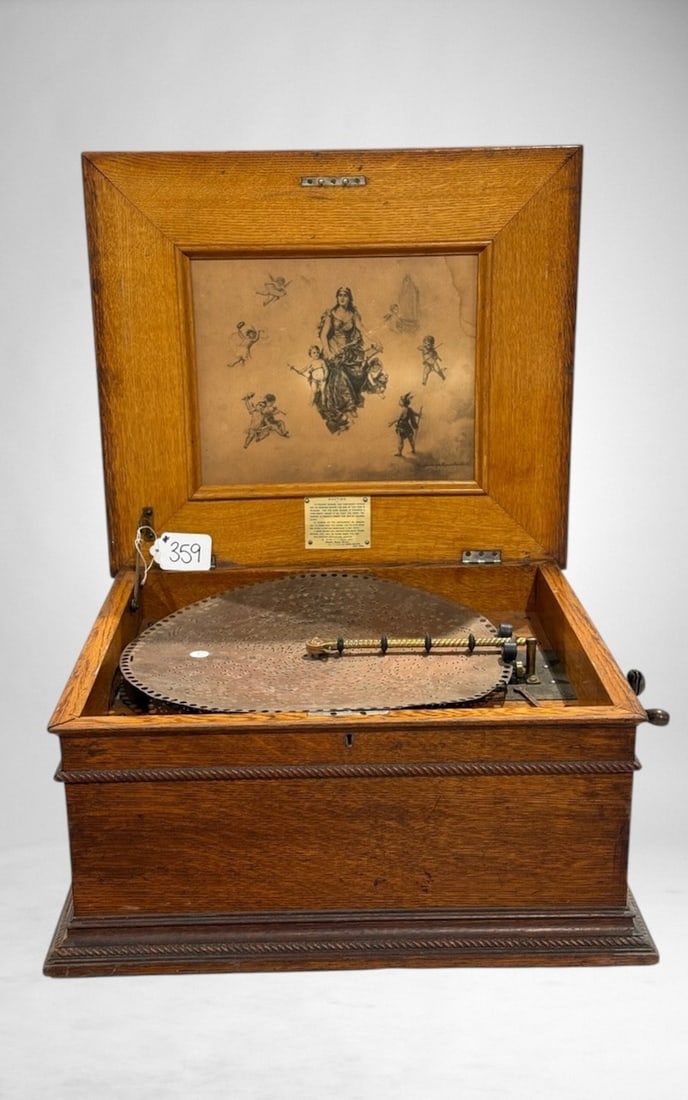 Regina Style No. 11 15-1/2" Disc Music Box: Oak, One broken tooth. 10 Discs Included. SN-14692