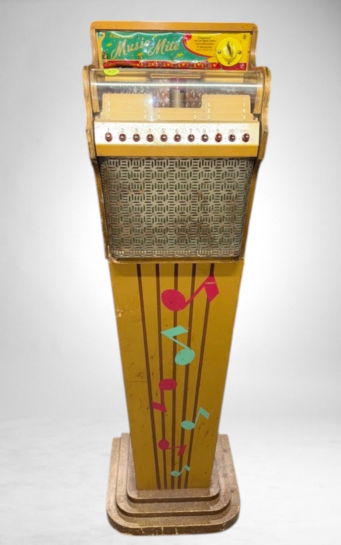Williams Music Mite Phonogrpah: Coin operated, 5¢, with matching base pedestal. Plays 45 rpm records. Untested. ‘This Lot must be picked up in Fordland, MO on September 28 & 29’