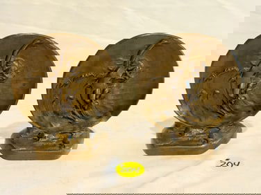 Original 1920s art deco dancing nude brass bookends in the waves.