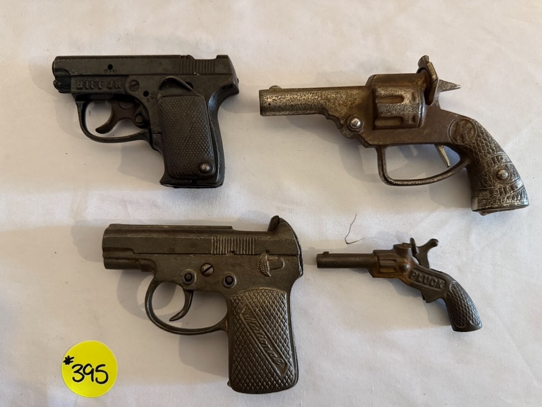 Group of Toy Cap Guns: Pluck, National, Biff Jr. , and Kilgore Nig Bill. One Lot