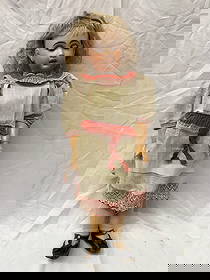 Rare Bebe Jumeau Phonograph Doll: The bisque doll contains a Lioret phonograph mechanism with 3 Bebe Jumeau records. Also included is the original box. This is a rare and wonderful example