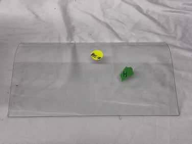 Curved or bent glass for an H coin operated machine