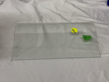 Curved or bent glass for an H coin operated machine