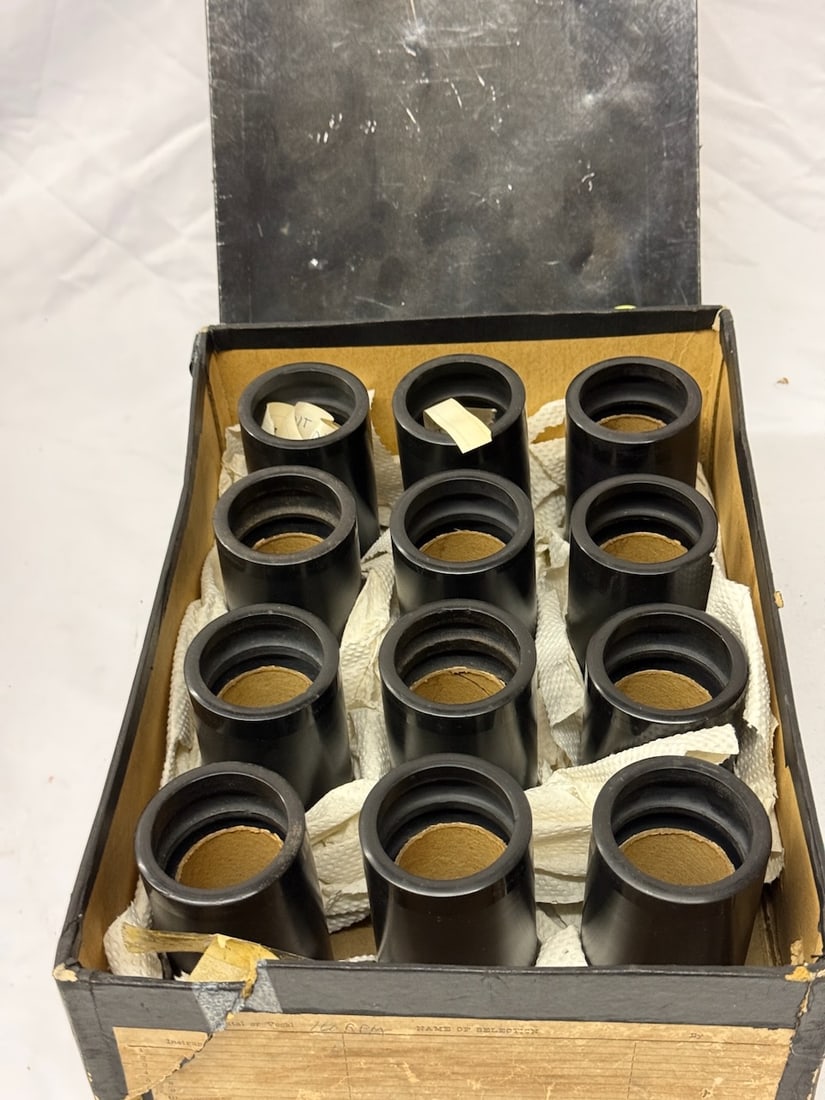 A 12-place box of Black Wax Cylinders: In pegged shipping box.