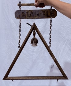 An Unusual Hanging and Lighted Store Sign