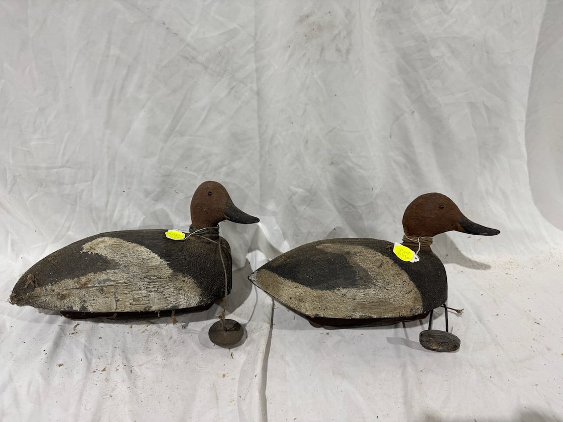 2 Carved Duck Decoys: Both w/water weights; Largest measures 16" x 9"