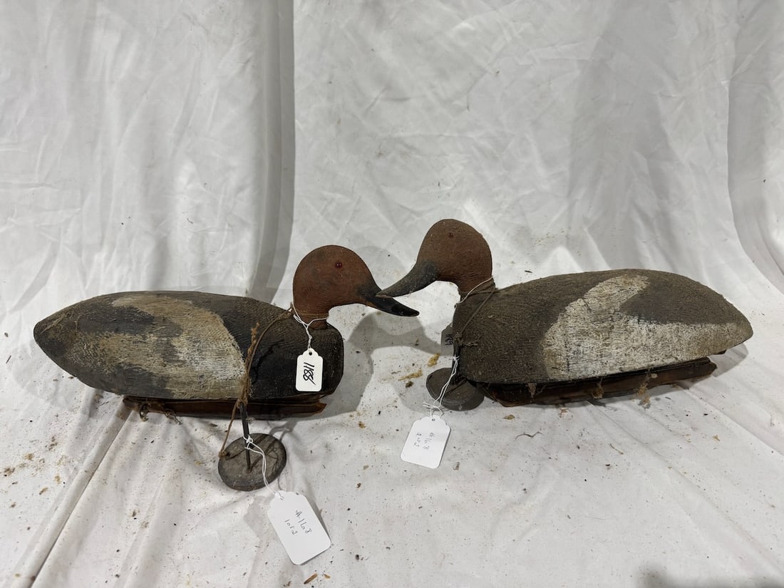 Pair of Carved Decoys: Left one measures 18" x 9"; both have water weights