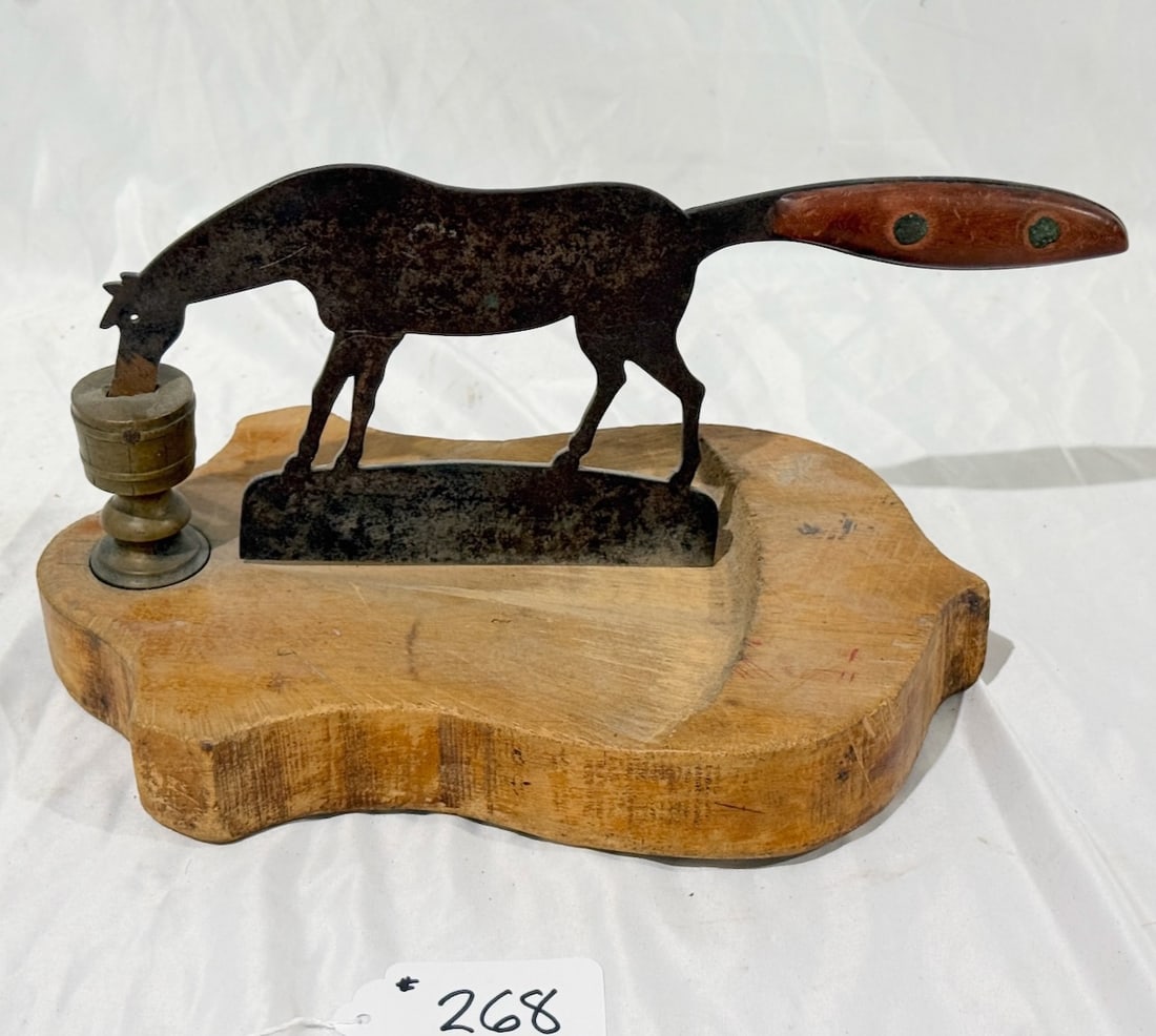 Figural Tobacco Cutter: Tin cut-out of Horse; wooden shield base; 12" long; 6-1/2" tall