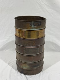 A stack of 7 Brass Sifting Sieves