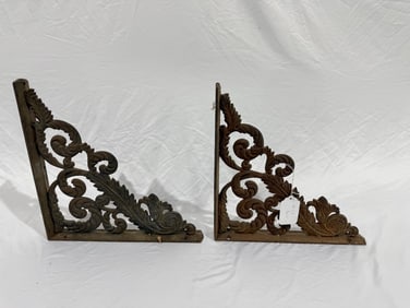 An excellent cast pair of shelf brackets