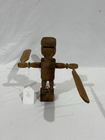 An oak carved Whirligig