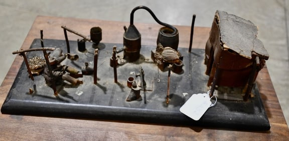 Folk Art Carving of a Moonshine Operation