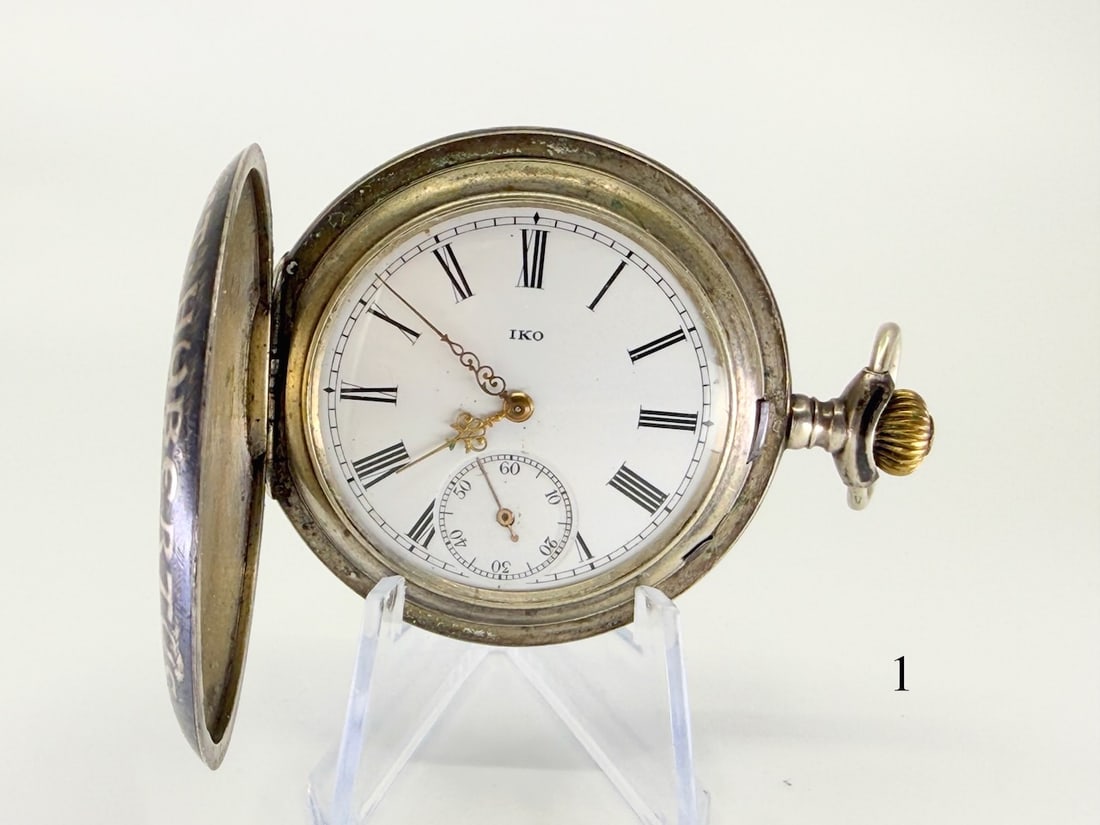 Neilo IKO Pocket Watch: 16s, 15j, H.C. ,Swiss movement, stem wind, pendant set, housed in a hunter case decorated with St. Hubertus; case interior marked NIEL.