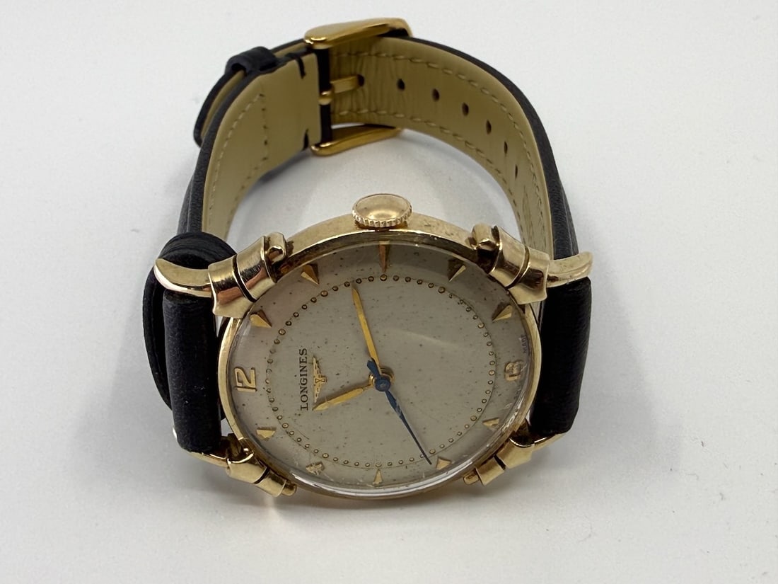 Longines Auto Wristwatch: Ribbon lugs, case no. 926064, 14K. Total Weght with band. 29.6g