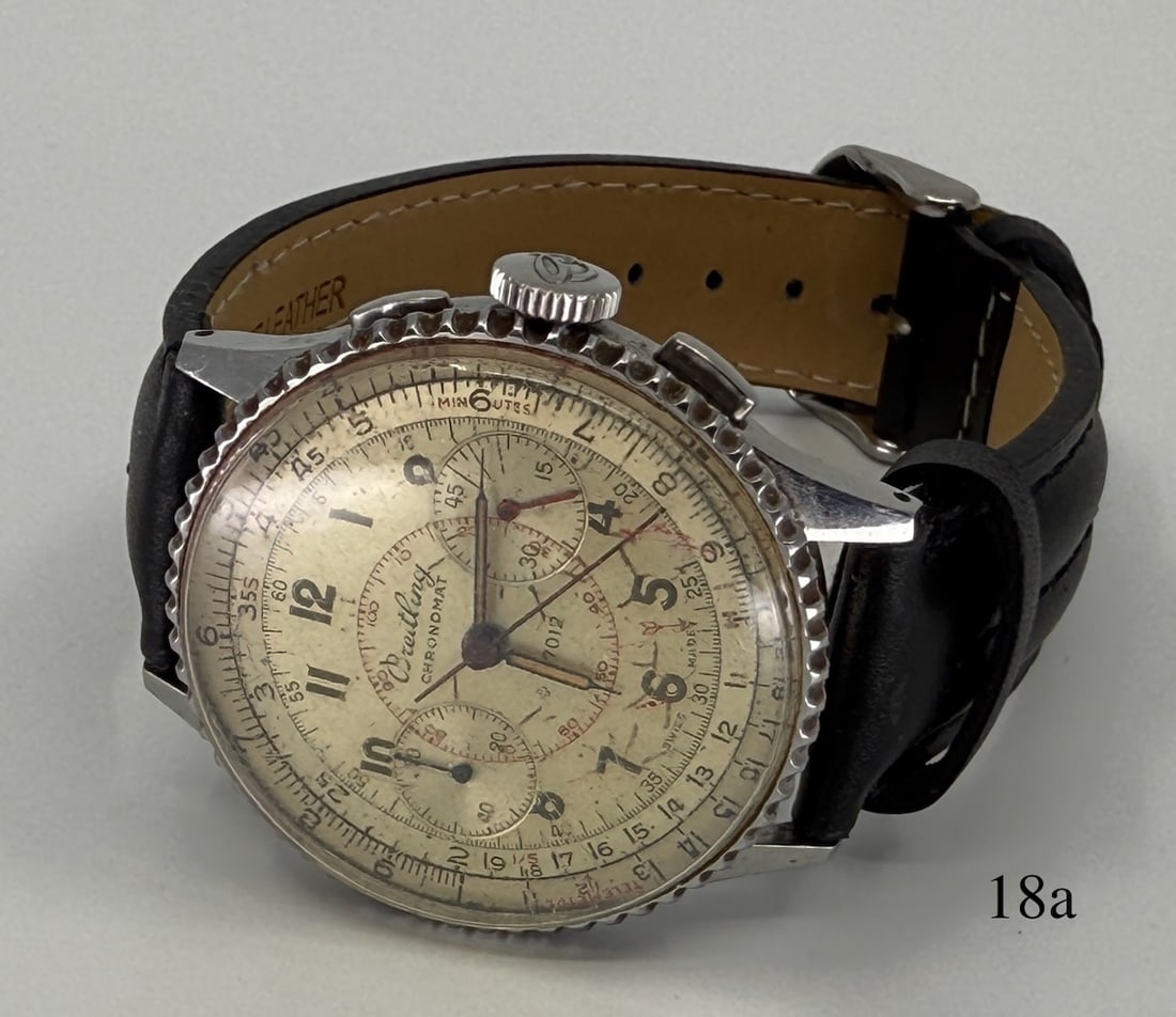 Breitling 769 Chronomat Wristwatch: Breitling SS W.W. 1940 Slide Rule, Marked Acier Inoxydable on back cover. No serial number stamped on back.
