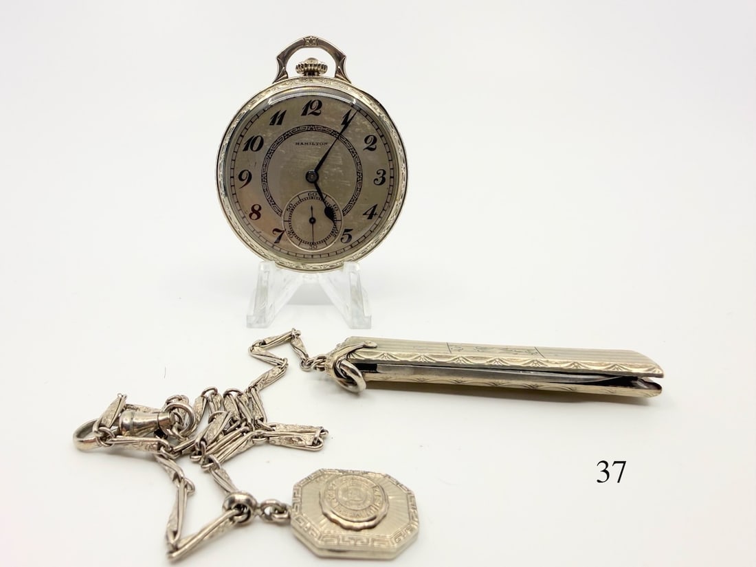 Hamilton 912 Pocket Watch: 12s, 17j, Adj, no. 3337503, w/box paper, knife, chain and U of M Locket. 14k gold filled case no. 0334858. Total Weight Watch 60.4g
